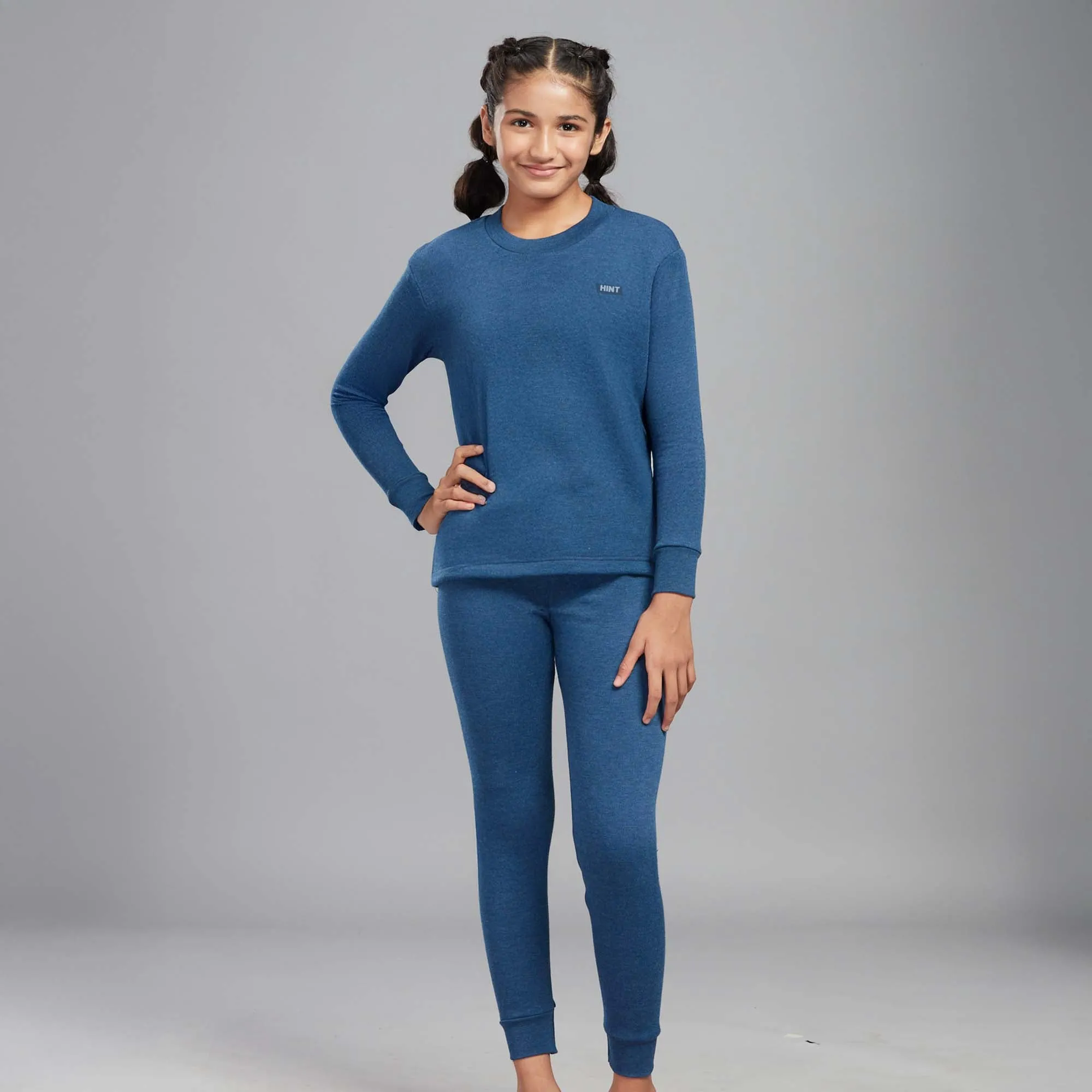 Soft Polyester-Viscose Blend Alpine Thermal Trousers for Kids with an Elastic Waistband, Slim Fit, and Cuffed Bottoms - Blue Melange