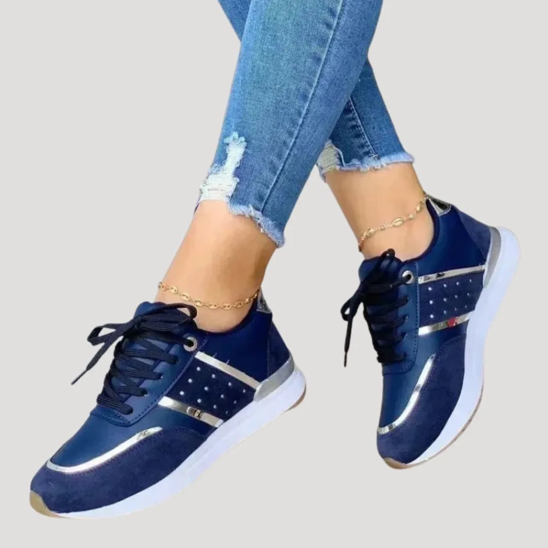 Women stylish metallic accent trainers
