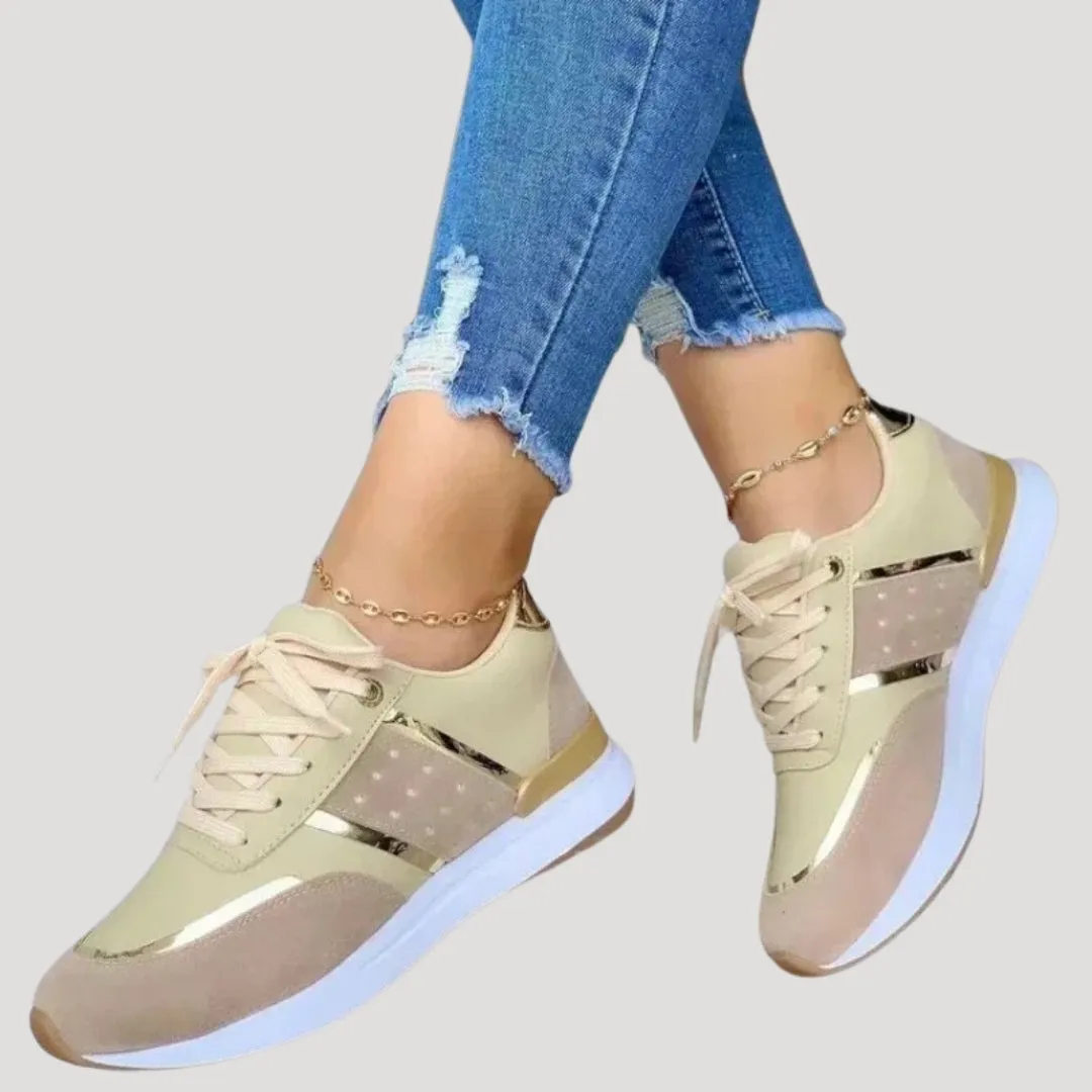 Women stylish metallic accent trainers
