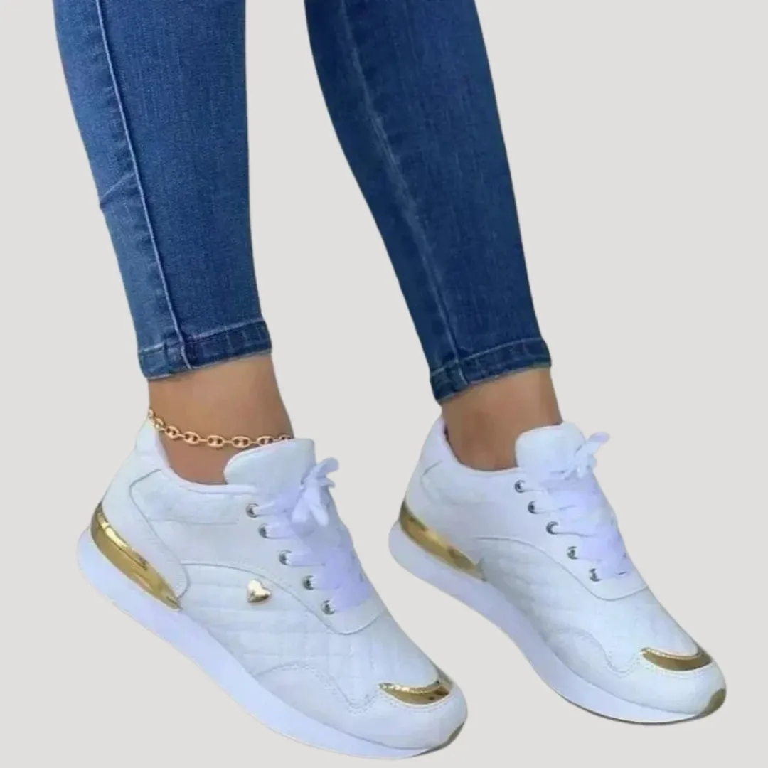 Women stylish metallic accent trainers