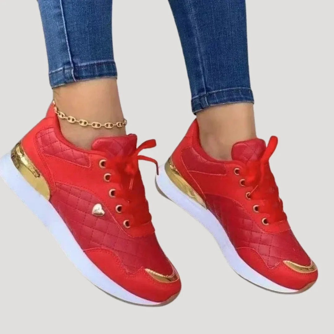 Women stylish metallic accent trainers
